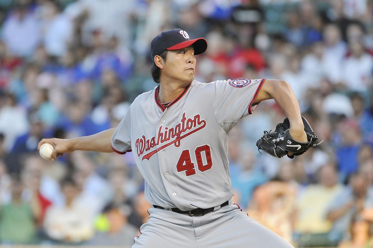 CHICAGO, IL - AUGUST 09:  Starting pitcher Chien-Ming Wang #40 of the Washington Nationals delivers during the first inning against the Chicago Cubs at Wrigley Field on August 9, 2011 in Chicago, Illinois.  (Photo by Brian Kersey/Getty Images)
