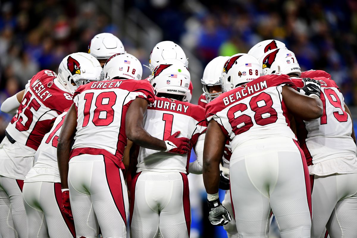 Kyler Murray #1 of the Arizona Cardinals huddles with teammates during a game against the Detroit Lions at Ford Field on December 19, 2021 in Detroit, Michigan.