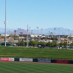 Superstition Mountains in view beyond right-center field