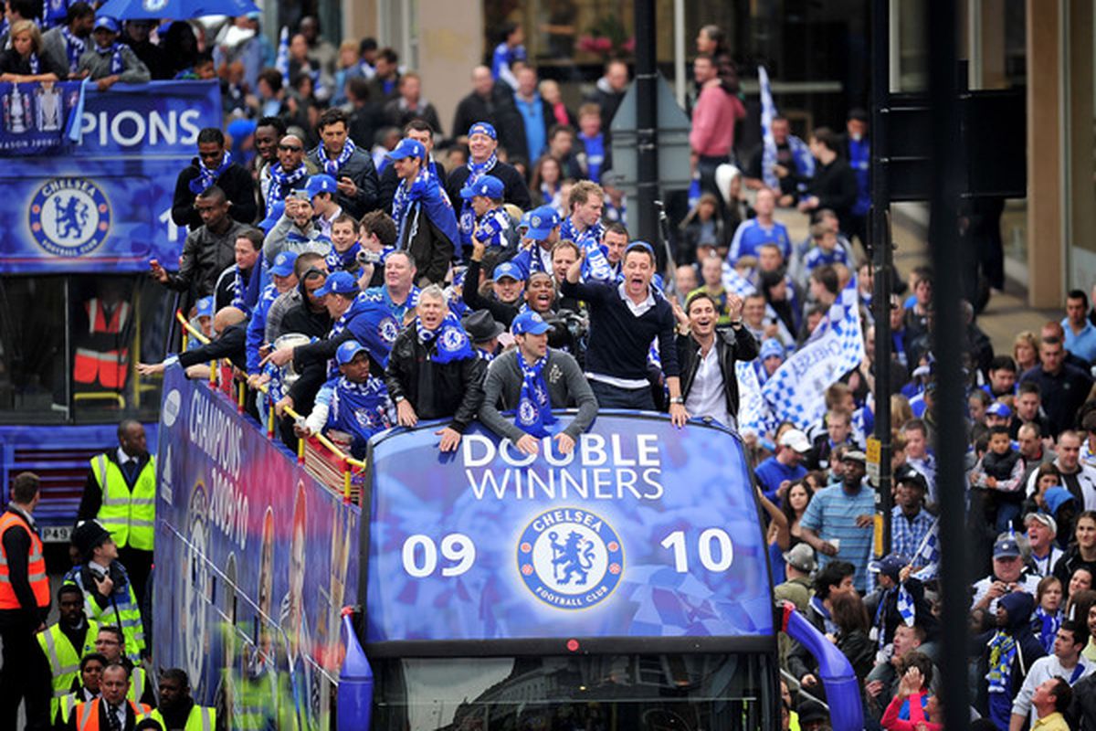 LONDON, ENGLAND - MAY 16:  John Terry, Frank Lampard and the Chelsea Football Team parade their silverware on an open top bus on the Kings Road, Chelsea, on May 16, 2010 in London, England.  (Photo by Clive Mason/Getty Images)