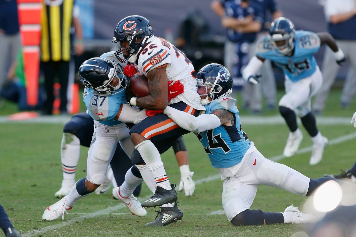 Bears running back David Montgomery (32) rushed for 30 yards on 14 carries (2.1 avg.) against the Titans on Sunday, with a fumble that was returned for a touchdown in the third quarter. He also suffered a concussion that puts his status in doubt for Monday night’s game against the Vikings. 