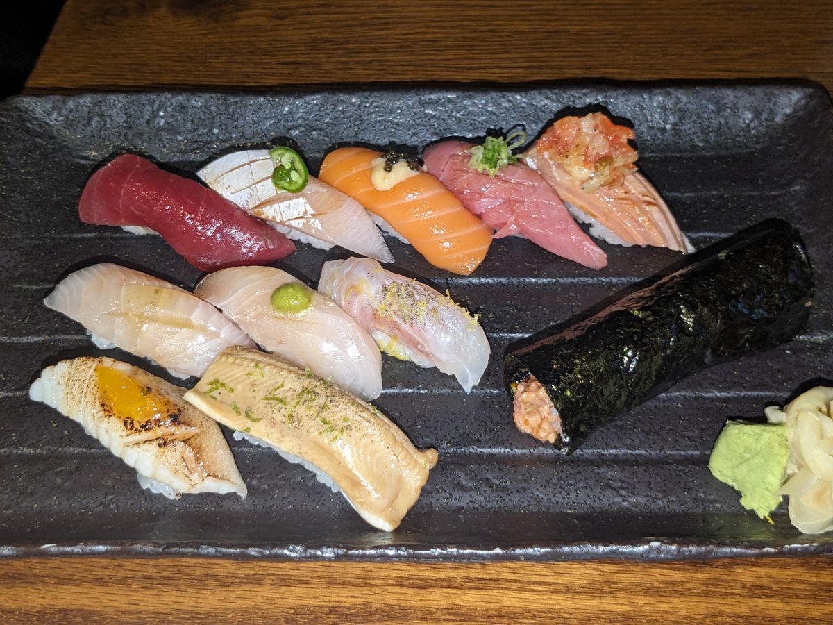 A tray with 10 pieces of sushi.