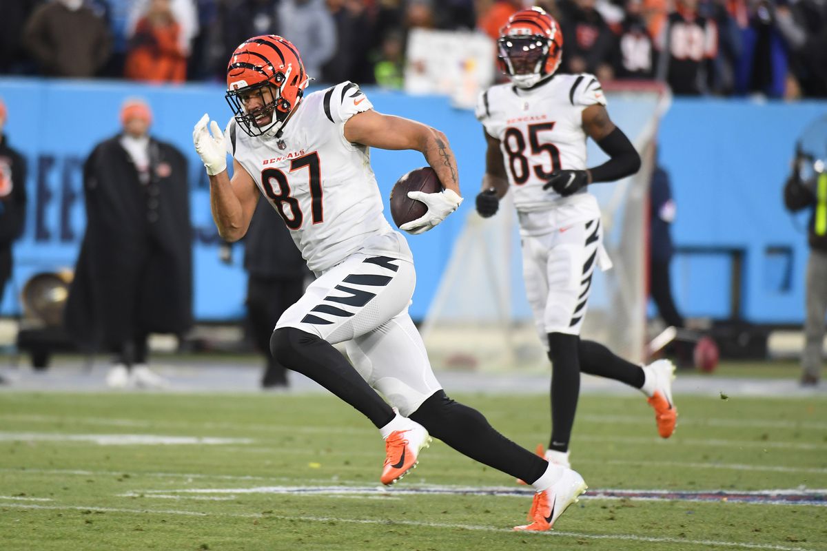 Cincinnati Bengals tight end C.J. Uzomah (87) runs after a reception against the Tennessee Titans during a AFC Divisional playoff football game at Nissan Stadium.