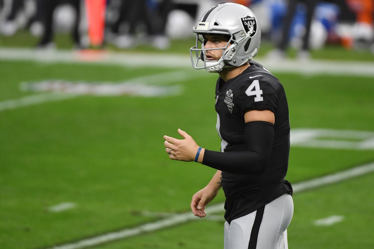 Quarterback Derek Carr #4 of the Las Vegas Raiders looks to his sideline in the first half of a game against the Indianapolis Colts at Allegiant Stadium on December 13, 2020 in Las Vegas, Nevada. The Colts defeated the Raiders 44-27.