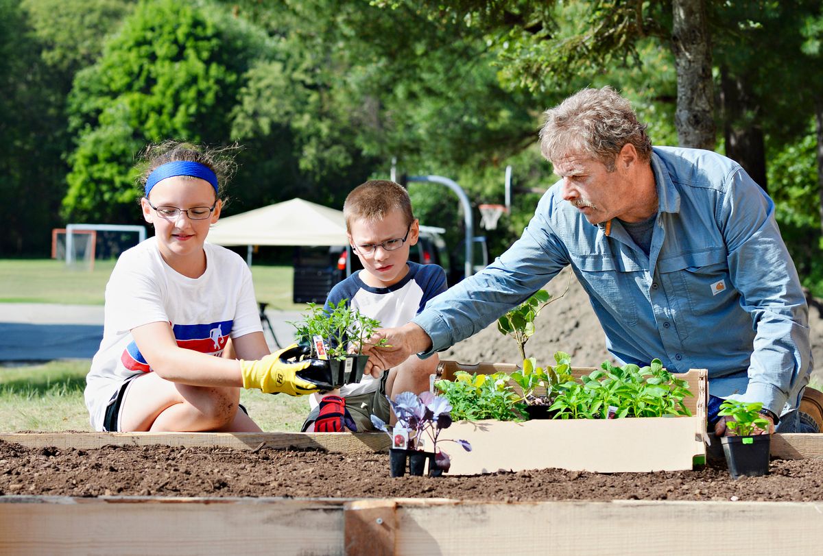 Roger Cook and Raised Garden Bed with Kids
