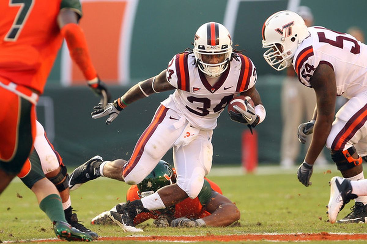 MIAMI - NOVEMBER 20:  Ryan Williams #34 of the Virginia Tech Hokies runs with the ball during a game against the Miami Hurricanes at Sun Life Stadium on November 20 2010 in Miami Florida.  (Photo by Mike Ehrmann/Getty Images)