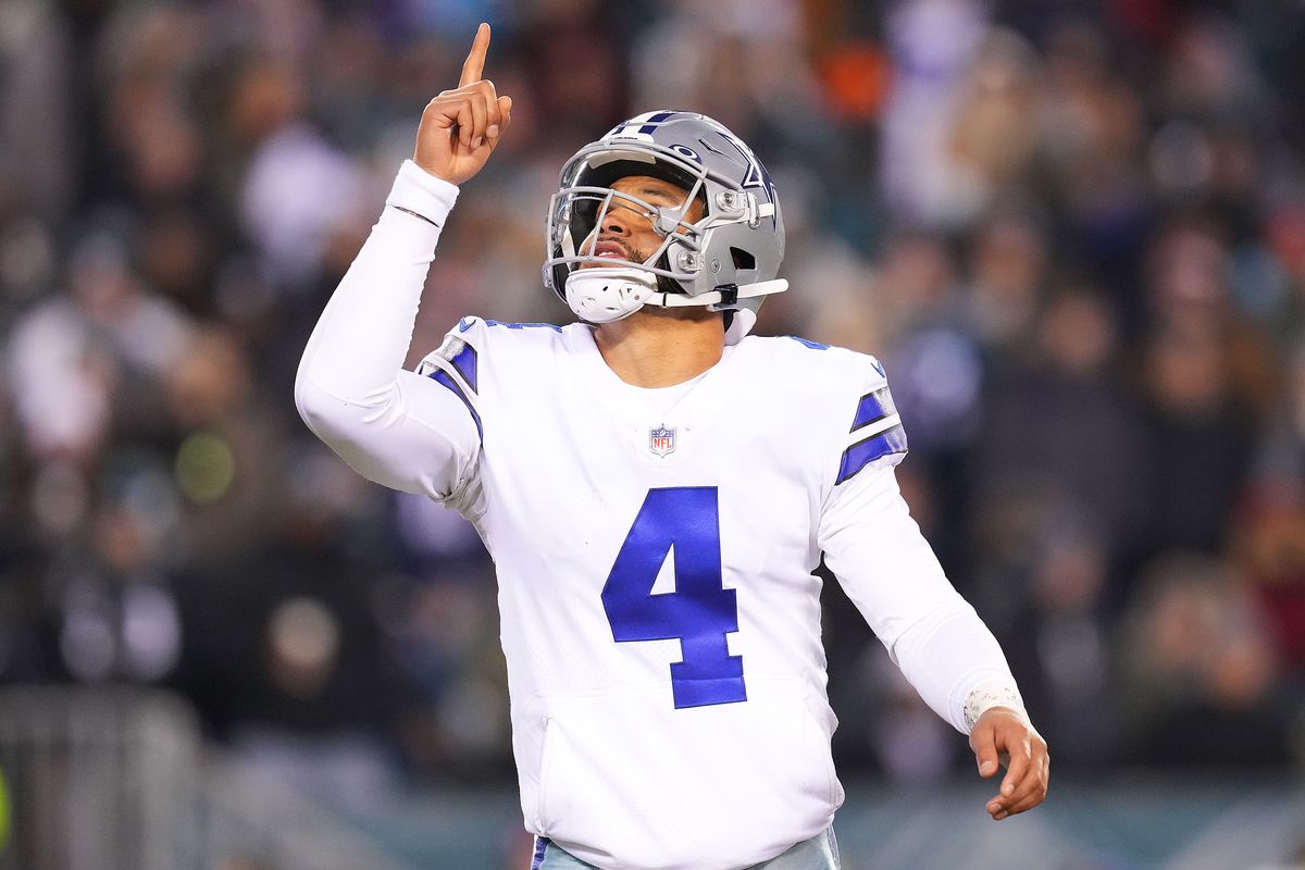 Dak Prescott #4 of the Dallas Cowboys reacts after throwing a touchdown in the fourth quarter of the game against the Philadelphia Eagles at Lincoln Financial Field on January 08, 2022 in Philadelphia, Pennsylvania.