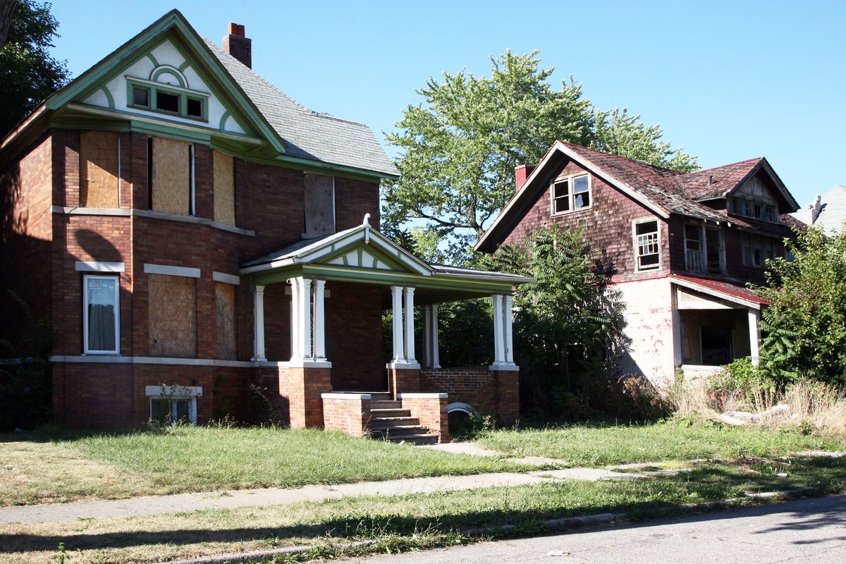 Two abandoned homes in Detroit.