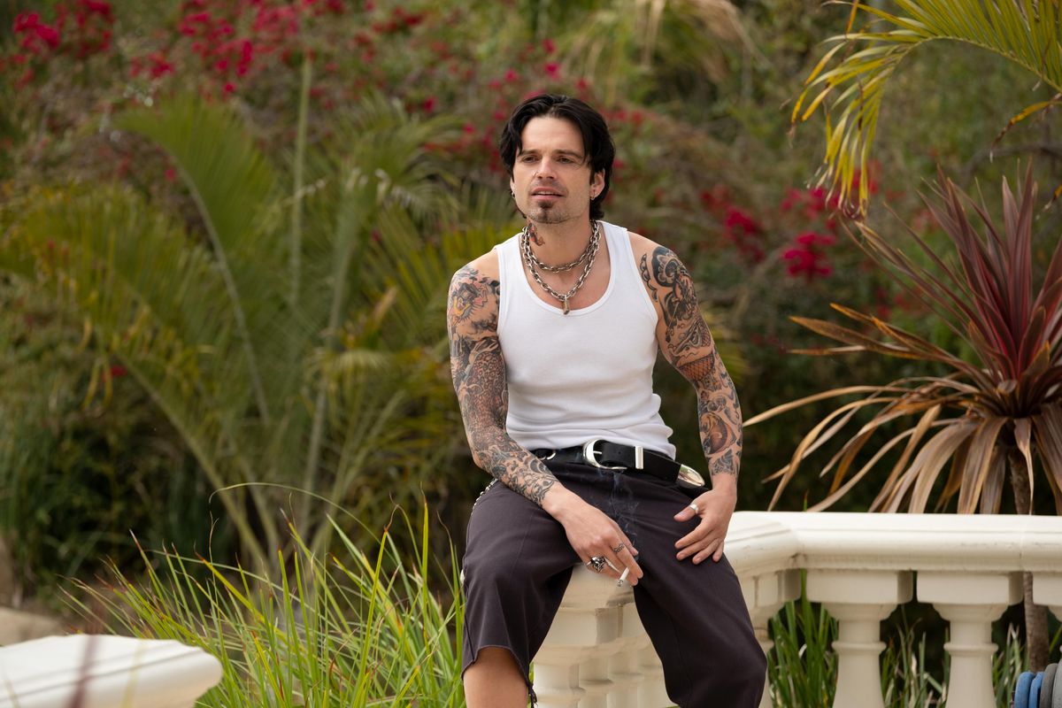 Sebastian Stan as Tommy Lee in Pam & amp;  Tommy sitting on deck