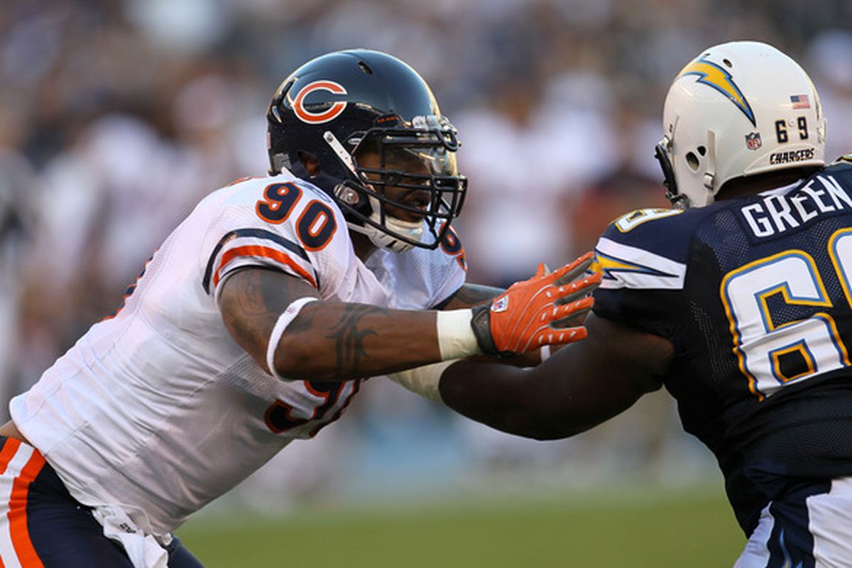 SAN DIEGO - AUGUST 14:  Defensive end Julius Peppers #90 of the Chicago Bears battles offensive guard Tyrondne Green #69 of the San Diego Chargers on August 14 2010 at Qualcomm Stadium in San Diego California.   (Photo by Stephen Dunn/Getty Images)