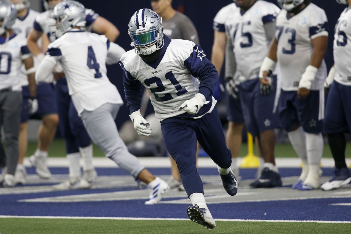 Dallas Cowboys running back Ezekiel Elliott runs a drill during practice at the Ford Center at the Star in Frisco.