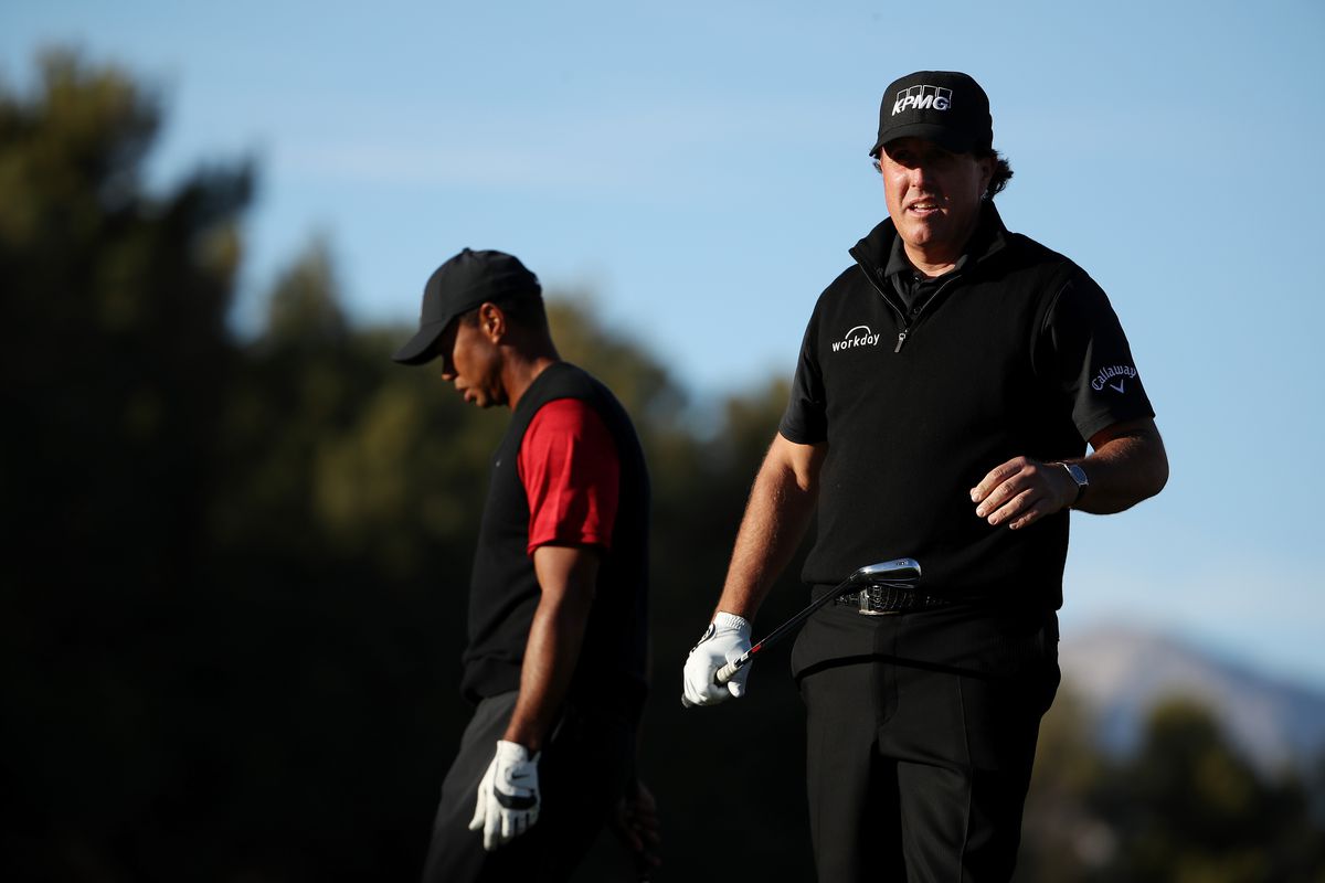 Tiger Woods and Phil Mickelson walk during The Match: Tiger vs Phil at Shadow Creek Golf Course on November 23, 2018 in Las Vegas, Nevada.