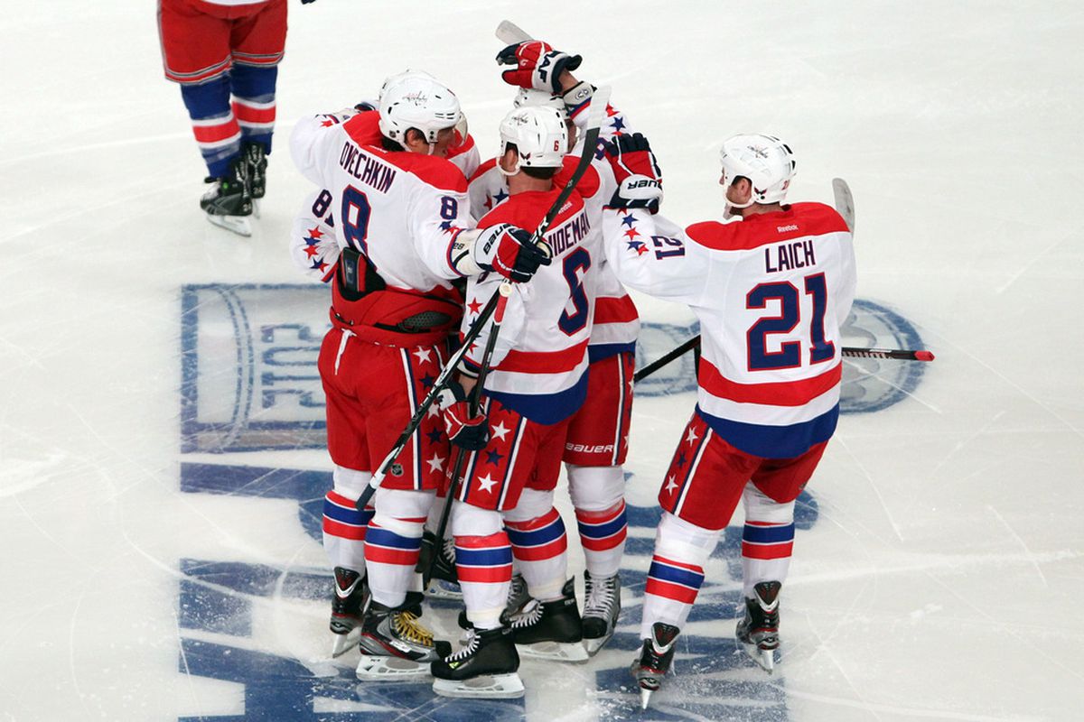 Apr 7 2012; New York, NY, USA;  Washington Capitals left wing Alex Ovechkin (8) celebrates scoring with teammates during the first period against the New York Rangers at Madison Square Garden.  Mandatory Credit: Anthony Gruppuso-US PRESSWIRE