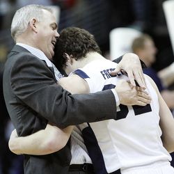 BYU head coach Jim Rose hugs BYU guard Jimmer Fredette (32) after the game as BYU defeated Gonzaga Saturday, March 19, 2011 in the third round of the NCAA Tournament at the Pepsi Center in Denver Colorado. Jimmer and wife Whitney recently opened up about their faith and family life to a popular LDS blog site, Normons.com.