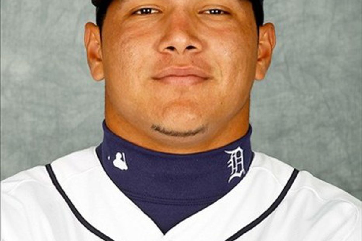 February 28, 2012; Lakeland, FL, USA; Detroit Tigers center fielder Avisail Garcia (33) poses for photo day in the rec room at the Detroit Tigers headquarters.  Mandatory Credit: Derick E. Hingle-US PRESSWIRE