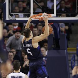 BYU's Kyle Collinsworth (5) dunks during the second half of an NCAA college basketball game against Gonzaga, Thursday, Jan. 14, 2016, in Spokane, Wash. BYU won 69-68. (AP Photo/Young Kwak)