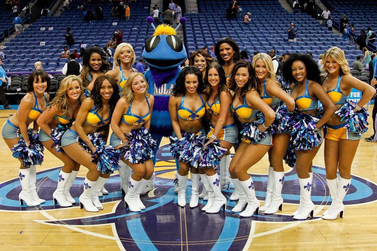 April 13, 2012; New Orleans, LA, USA; New Orleans Hornets cheerleaders pose with mascot Hugo following a win over the Utah Jazz at the New Orleans Arena. The Hornets defeated the Jazz 95-86.  Mandatory Credit: Derick E. Hingle-US PRESSWIRE