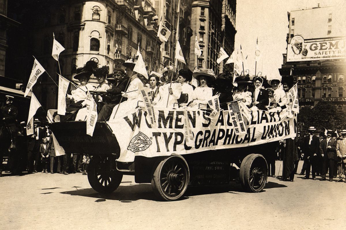Historical black and white photo of Women’s Auxiliary Typographical Union on parade float