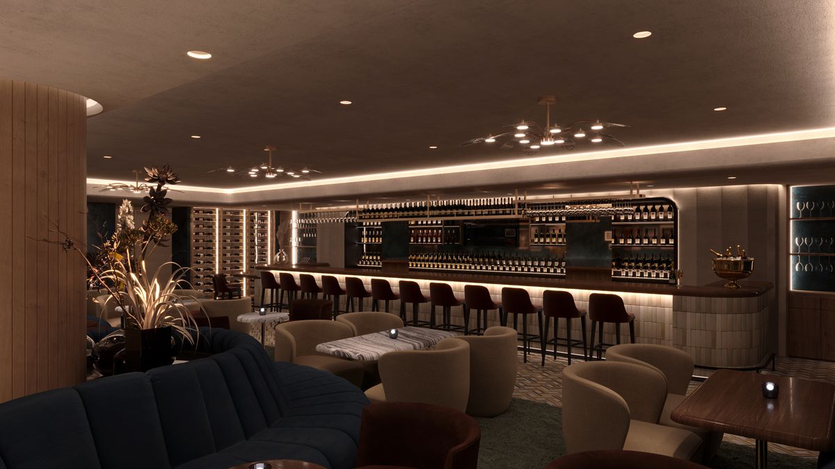 A long bar inside a lounge with moody lighting