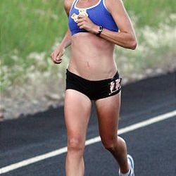 Jenn Shelton runs near mile 9 in the Deseret News Marathon Saturday.