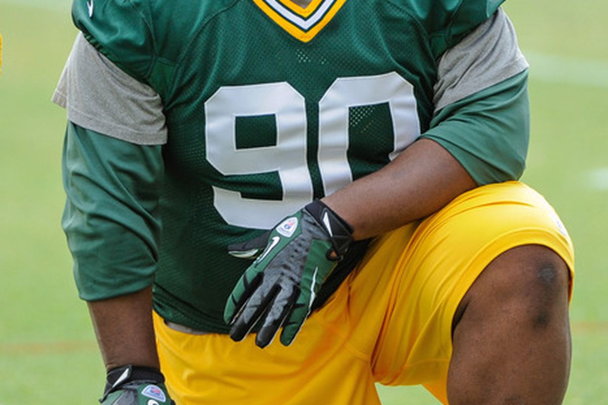 June 12, 2012; Green Bay, WI, USA;   Green Bay Packers defensive tackle B.J. Raji (90) takes a break during the team's mandatory minicamp at Ray Nitschke Field.  Mandatory Credit: Benny Sieu-US PRESSWIRE