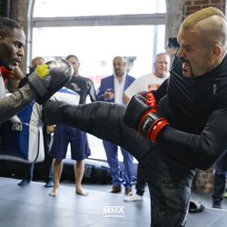 Chuck Liddell practices his kicks at the Liddell vs. Ortiz 3 open workouts at Kings MMA in West Hollywood, Calif.