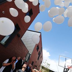 Balloons are released during the VOA Youth Resource Center opening in Salt Lake City Tuesday, May 24, 2016. The new 30-bed shelter will offer 24/7 support and enhanced programming
to support teens struggling with homelessness.