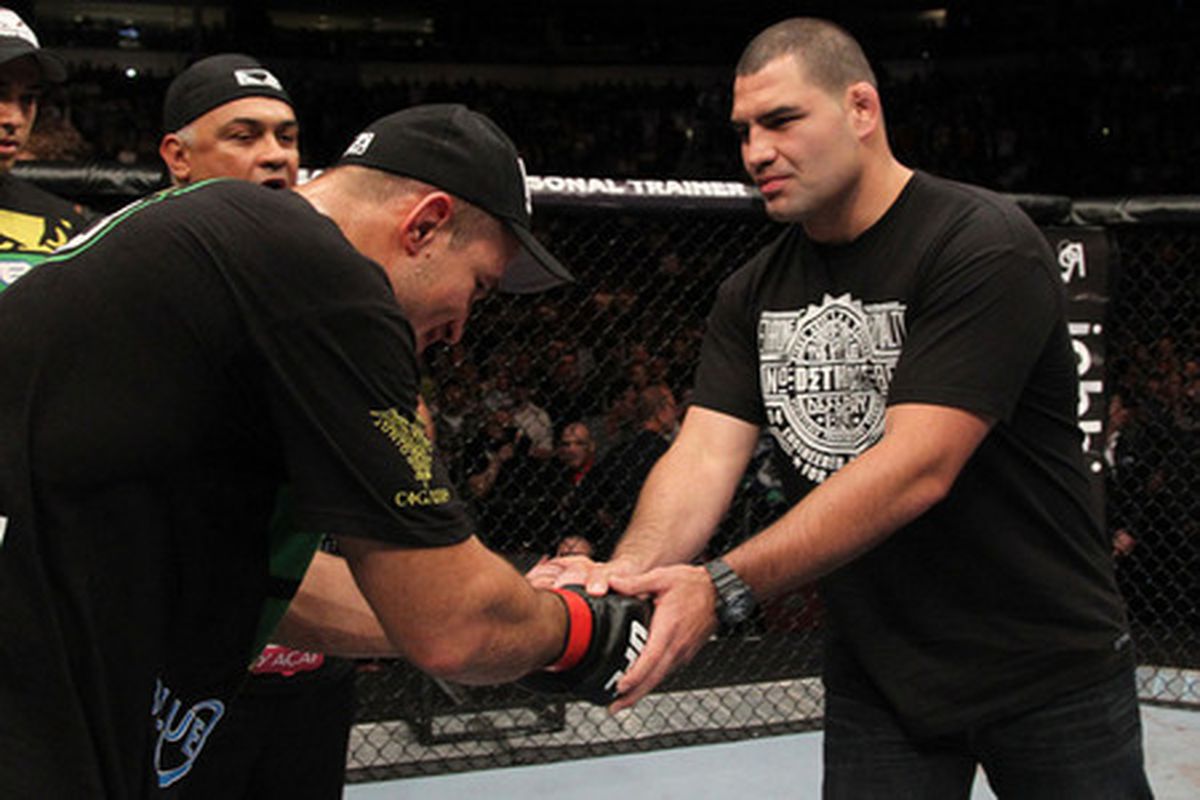 Champ Cain Velasquez and future challenger Junior dos Santos shake hands after dos Santos' victory at UFC 131. Photo by Donald Miralle/Zuffa LLC/Zuffa LLC via Getty Images