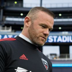 FOXBOROUGH, MA - MAY 25: D.C. United forward Wayne Rooney #9 insepcts the turf prior to the game against the New England Revolution at Gillette Stadium on May 25, 2019 in Foxborough, Massachusetts. (Photo by J. Alexander Dolan - The Bent Musket)