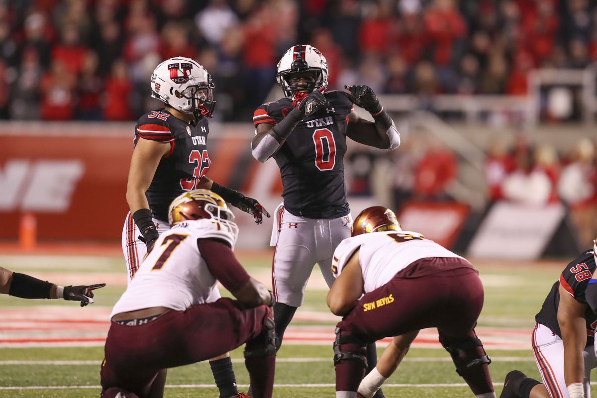 Utah Utes linebacker Devin Lloyd (0) instructs the defense during the first quarter against the Arizona State Sun Devils at Rice-Eccles Stadium.