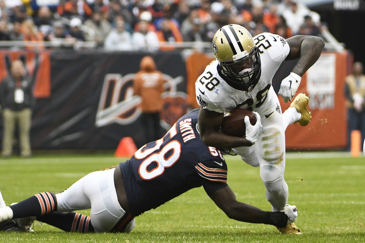 Bears linebacker Roquan Smith (58) trips up Saints running back Latavius Murray (28) in the first quarter Sunday at Soldier Field. Smith had six tackles and a pass break-up in the game.