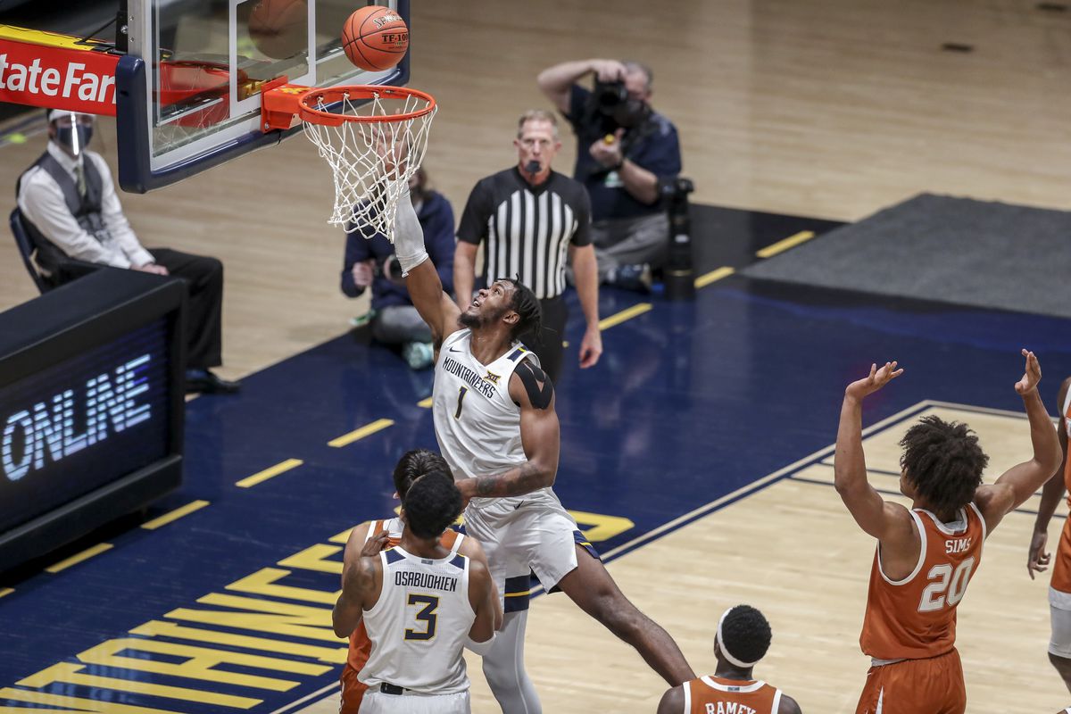 West Virginia Mountaineers forward Derek Culver shoots in the lane during the first half against the Texas Longhorns at WVU Coliseum.