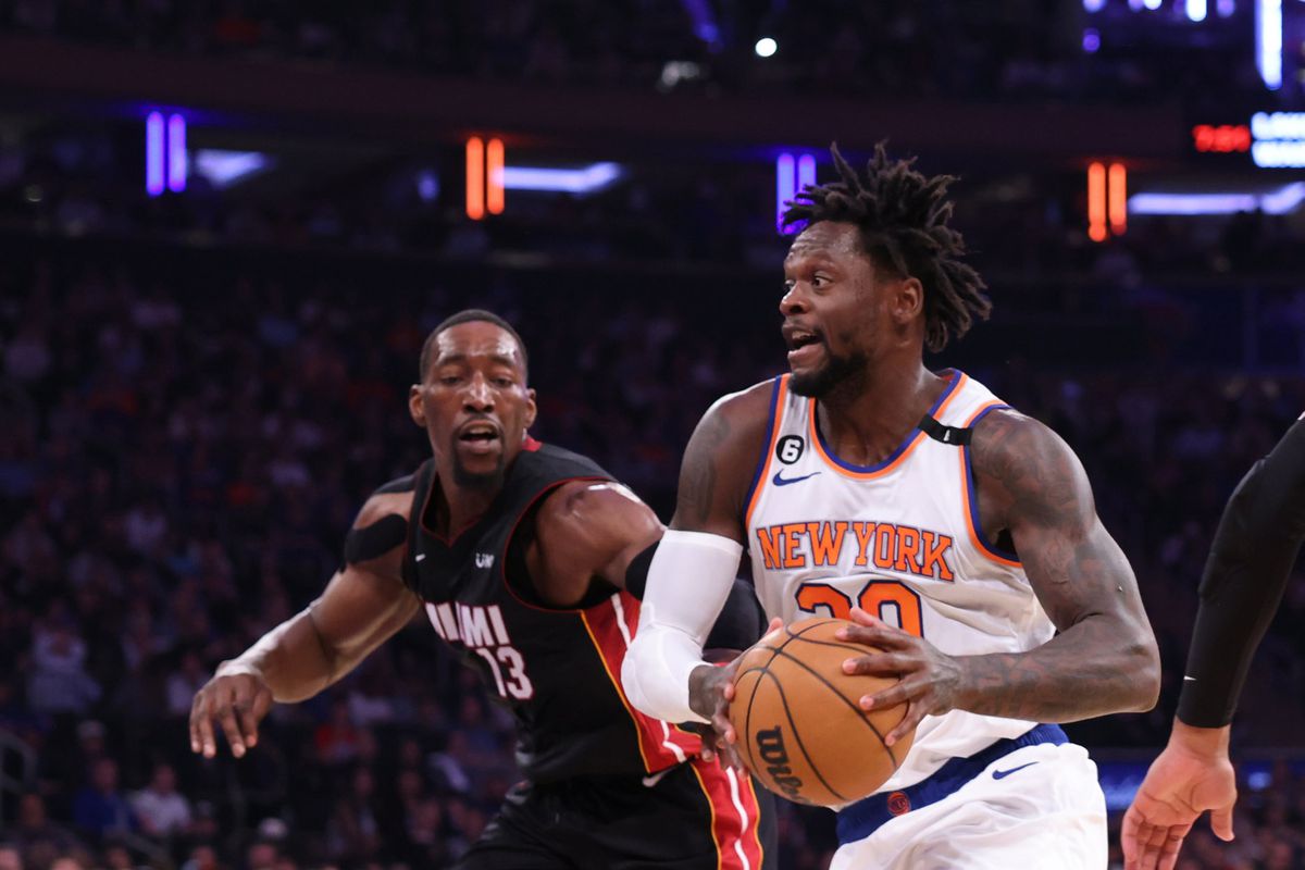 New York Knicks forward Julius Randle drives on Miami Heat center Bam Adebayo