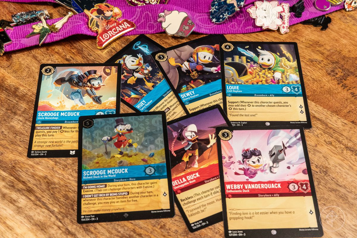 Scrooge McDuck, Huey, Duey, Louie, Della, and Webby cards from Disney Lorcana’s Into the Inklands set.