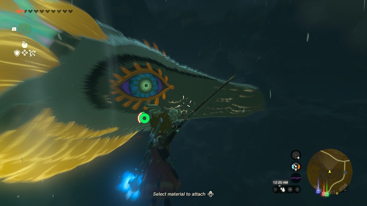 Link suspends himself in the air while aiming with his bow to the Light Dragon’s mouth in Zelda: Tears of the Kingdom