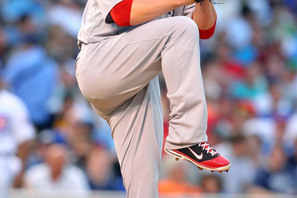 Jun 16, 2012; Chicago, IL, USA; Boston Red Sox starting pitcher Jon Lester (31) delivers a pitch in the fifth inning against the Chicago Cubs at Wrigley Field. Mandatory Credit: Dennis Wierzbicki-US PRESSWIRE