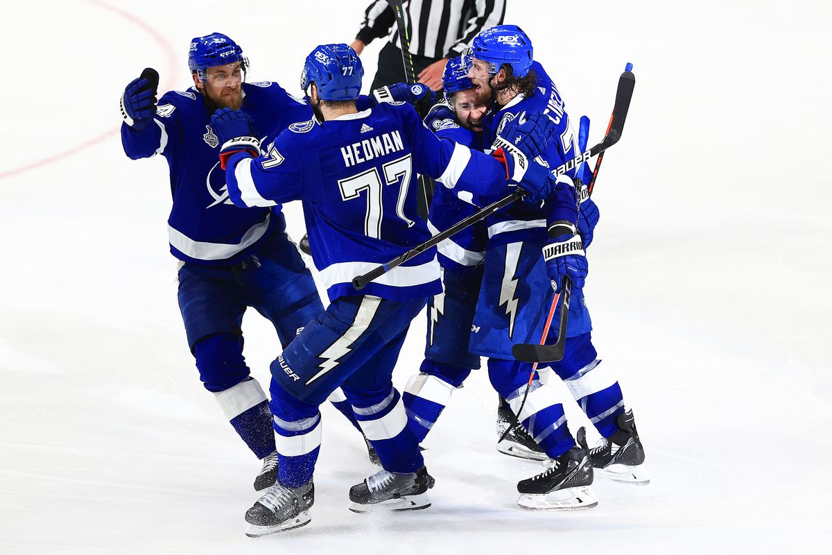Anthony Cirelli #71 of the Tampa Bay Lightning celebrates with teammates Tyler Johnson #9, Victor Hedman #77, and Jan Rutta #44 after scoring against Carey Price #31 of the Montreal Canadiens during the second period in Game Two of the 2021 NHL Stanley Cup Final at Amalie Arena on June 30, 2021 in Tampa, Florida.