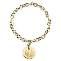 <b>Mannin Fine Jewelry</b> circle monogram charm bracelet, $295 at <a href="http://www.charmandchain.com/jewelry/bracelets/charm-bracelet/circle-monogram-charm-bracelet">Charm & Chain</a>