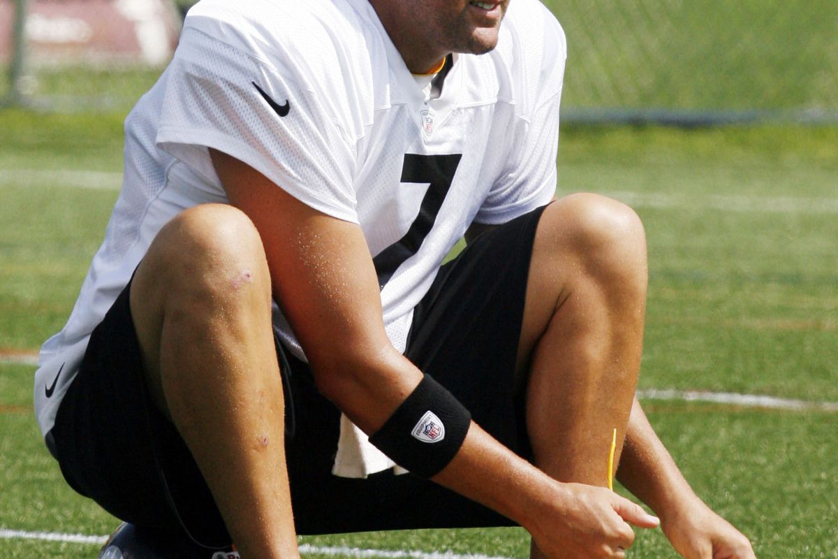 July 28, 2012; Pittsburgh, PA, USA; Pittsburgh Steelers quarterback Ben Roethlisberger (7) changes his shoes during training camp at Saint Vincent College. Mandatory Credit: Charles LeClaire-US PRESSWIRE