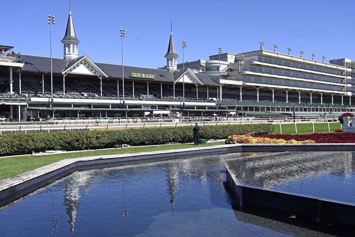Horses head down the stretch in front of the twin spires in the second race before the 146th Kentucky Derby at Churchill Downs.
