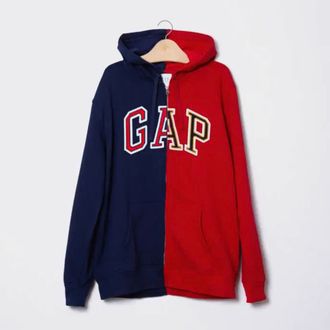 A Gap hoodie that is half red and half blue.