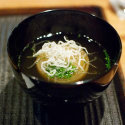 Japanese Onion Soup with Konbu seaweed, onion and chives from  Kajitsu by <a href="http://www.flickr.com/photos/gourmetgourmand/8137468026/in/pool-eater/">gourmetgourmand</a>