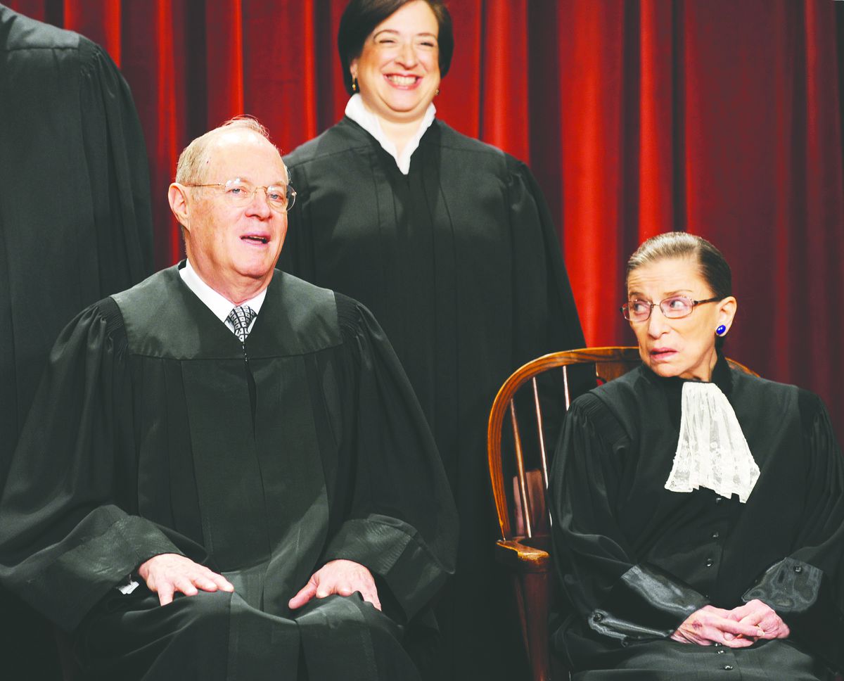 Anthony Kennedy and Ruth Bader Ginsburg chatting during an official Supreme Court photo session.