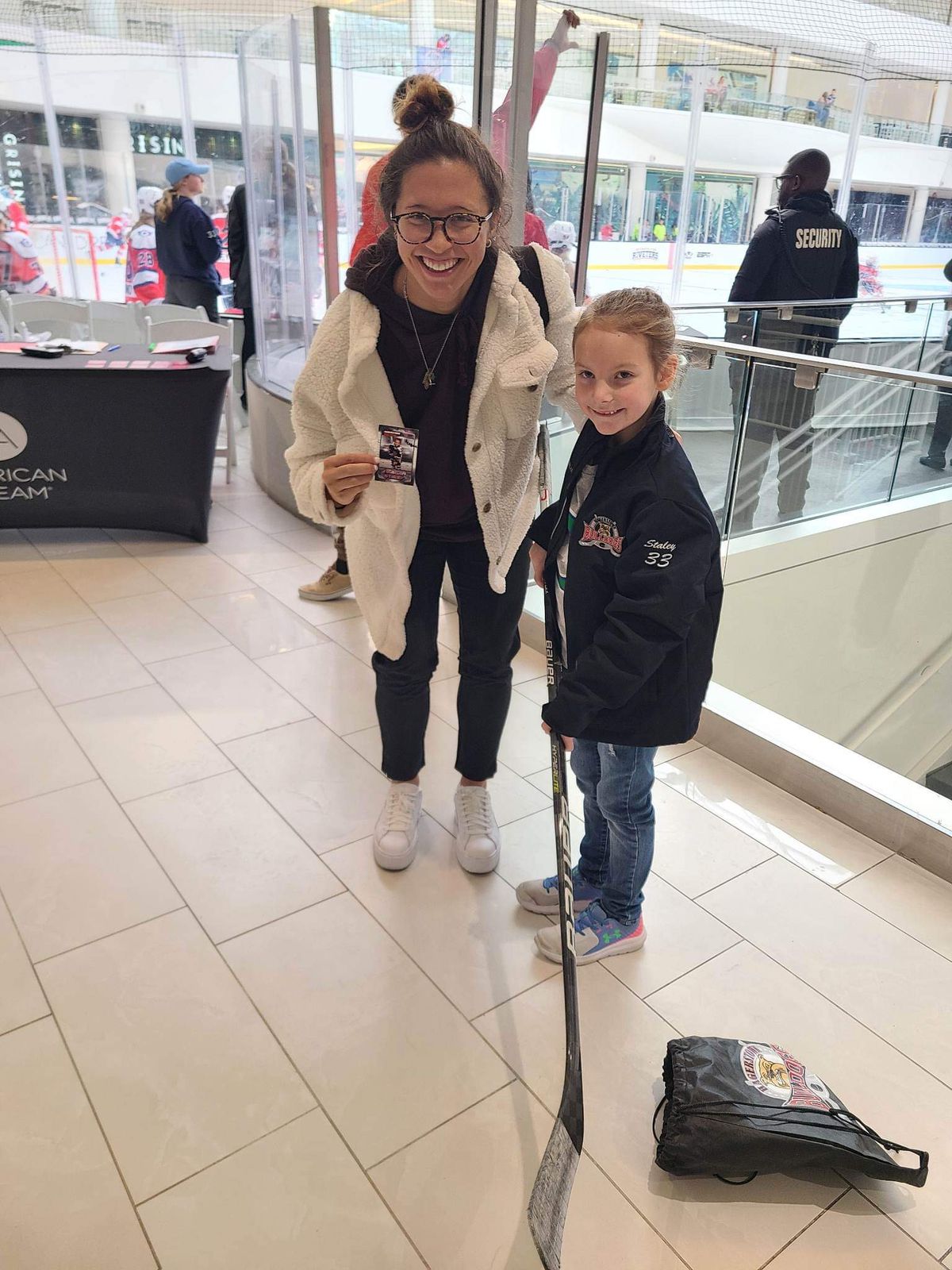 Connecticut’s Tori Sullivan poses with a young fan after a successful trade!