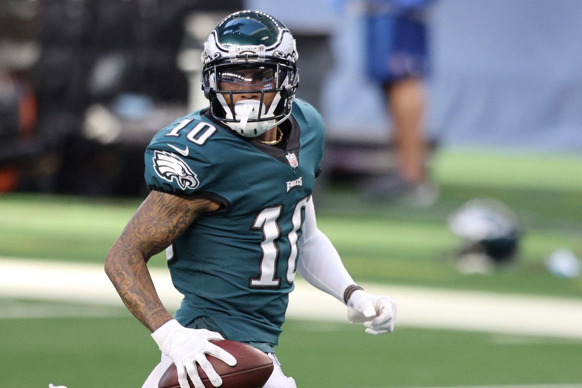 DeSean Jackson #10 of the Philadelphia Eagles runs after a catch for a touchdown in the first quarter against the Dallas Cowboys at AT&amp;T Stadium on December 27, 2020 in Arlington, Texas.