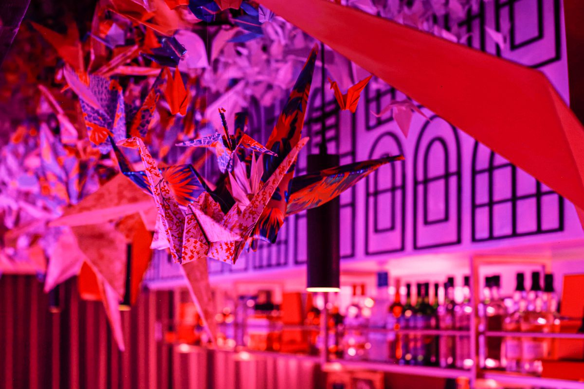Colorful cranes hang from the ceiling at Norigami.