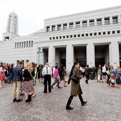 Conferencegoers make their way to the Conference Center in Salt Lake City prior to the morning session of the LDS Church’s 187th Annual General Conference on Sunday, April 2, 2017.
