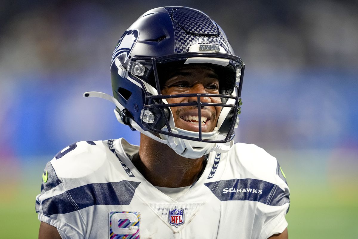 Tyler Lockett #16 of the Seattle Seahawks smiles before the game against the Detroit Lions at Ford Field on October 2, 2022 in Detroit, Michigan.