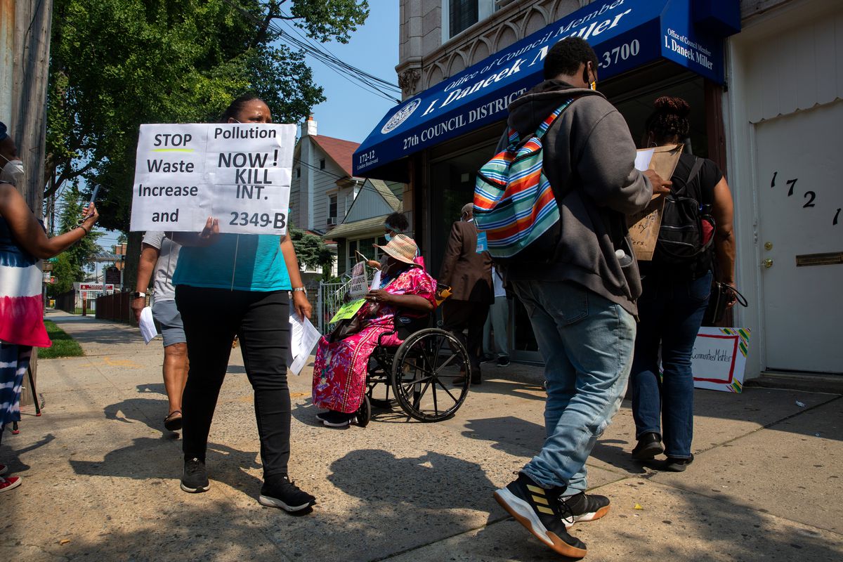 Southeast Queens community members protest a waste transfer station outside Councilmember Daneek Miller’s St. Albans office, July 27, 2021.