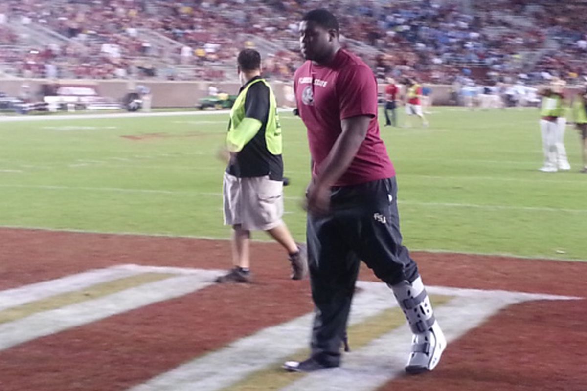 Eddie Goldman in boot and using cane